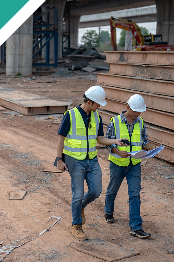 Risk surveyors on construction site